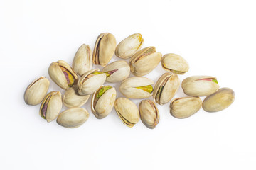 Pistachio, neatly laid out, beautiful work on a white background.