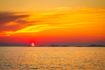 Sea landscape at sunset from Primosten town, a popular tourist destination on the Dalmatian coast of Adriatic sea in Croatia, Europe.