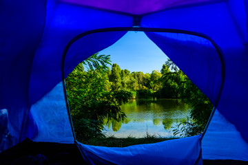 View on a river from tent in morning