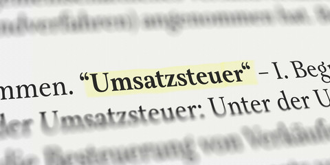 Das Wort Umsatzsteuer in einem Buch markiert