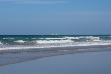 La Barrosa beach in Sancti Petri, Cádiz, with a large amount of sand without water as the tide is low
