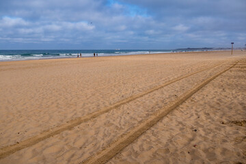 La Barrosa beach in Sancti Petri, Cádiz, with a large amount of sand without water as the tide is low