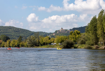 Canoeing on the river Dordogne at La Roque-Gageac, Aquitaine, France