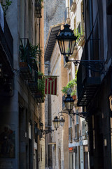 Narrow tiny street in Barcelona, Spain