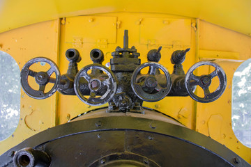 Mechanism of an old steam locomotive close up