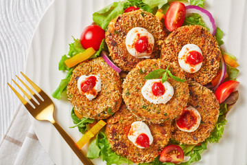 vegetarian burgers of chickpea, onion and greens