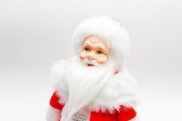 Santa Claus toy figure doll. Decoration for New Year and Christmas