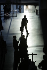 Silhouette of some people in the hall of a congress center in Fira Barcelona, Barcelona