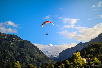 paraglider in the sky of switzerland