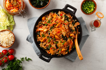 Kimchi cabbage with chicken. Prepared in a wok.