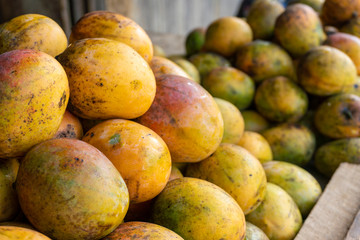 close-up pile of mangoes background