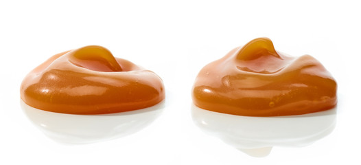 melted caramel on white background