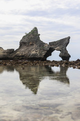 Fototapeta premium Atuh Beach on Nusa Penida Island, Bali, Indonesia. Amazing view with rocky mountains and azure lagoon with clear water of Indian Ocean 