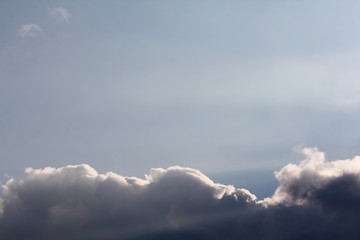 white fluffy clouds in the blue sky