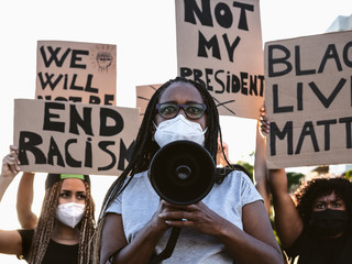 Activist movement protesting against racism and fighting for equality - Demonstrators from...