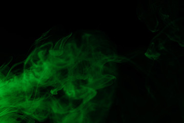 Green steam on a black background.