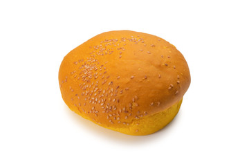 Yellow burger bread isolated on white.