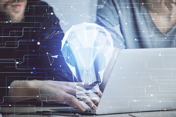 Growing arrows with businessman working on computer on background. Success concept. Double exposure.