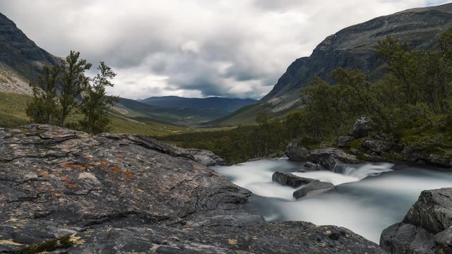 Hydalen in Hemsedal, Norway - The Beautiful and Peaceful Scenery With Glorious Trees and Massive Clouds - Wide Shot