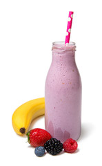 Berry mix smoothie  with banana and fresh ingredients in a glass bottle on a white background