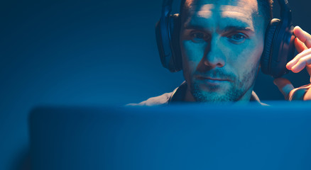 Men Listening Podcast on His Wireless Headphones