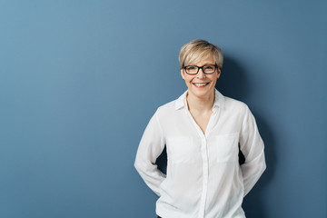 Vivacious blond woman with a happy beaming smile