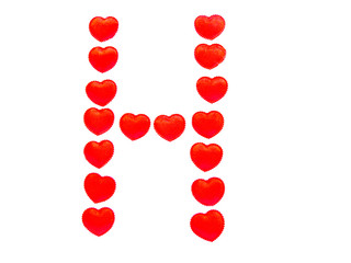Fototapeta na wymiar The letter H is made up of small red hearts isolated on a white background. Bright red font.