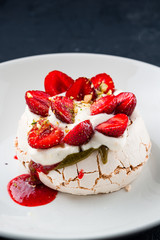 sweet dessert meringue with fresh strawberries
