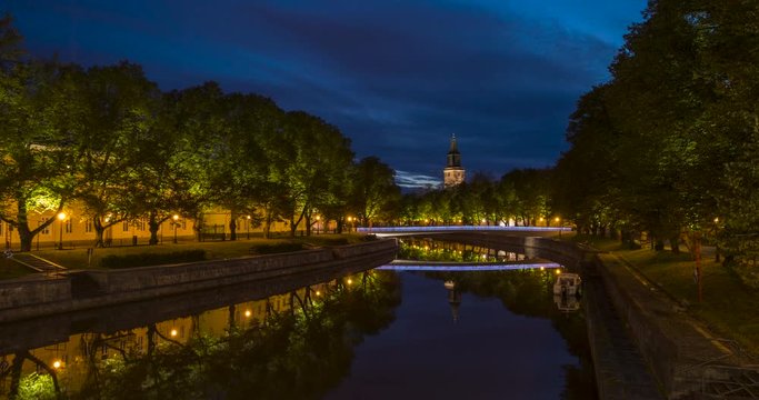Night to day time-lapse in Turku, Finland with aura river and the Turku Cathedral