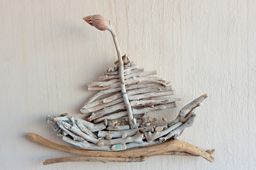 Unbranded wall decoration depicting ship of dry branches