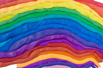 Plasticine rainbow gradient background. Kids artwork texture.