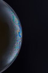 Current collection of brilliant backgrounds for your design. Close-up shot of a soap bubble with...