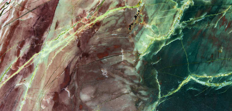 Green brown Jasper decorative stone background. Multicolor natural mineral surface with a unique pattern and texture. Macro view