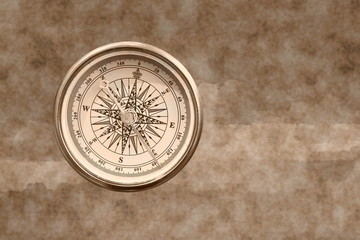 round compass on abstract background as symbol of tourism with compass, travel with compass and outdoor activities with compass