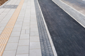 Fototapeta premium Road for bicycles, cars and trams
