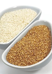 Natural Sesame and Gold Coloured Sesam, sesamum indicum, Seeds against White Background