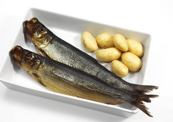 Smoked Herring or Bouffi Bloaster, clupea harengus, Smoked Fishes with Potatoes