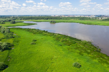 Fototapeta na wymiar Panoramic aerial view of the Volkhov River near Veliky Novgorod, natural attractions of Russia.