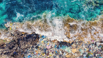 Concept environmental pollution ocean and water with garbage plastic and human waste. Aerial top view - obrazy, fototapety, plakaty