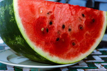 closeup of piece of watermelon on table