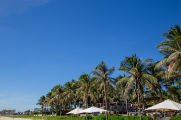 Fototapeta na wymiar Parasol by the beach in Da nang, Vietnam and blue sky