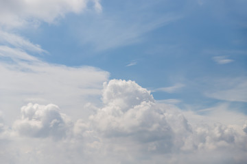 Fototapeta na wymiar Light blue white delicate sky with clouds, sky background