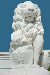 The traditional lion sculpture with a shield