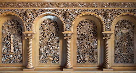 Carved wood paneling of hope chest
