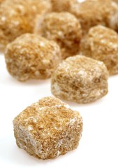 Brown Cube Sugar against White Background
