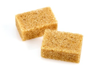 Brown Cube Sugar against White Background