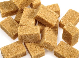 Brown Cube Sugar against White Background