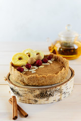 Homemade apple tart with cranberries, almond and cinnamon. Sugar, lactose, gluten free. Vegan dessert, diet, healthy food, without baking.