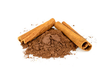 cinnamon powder and sticks isolated on a white background