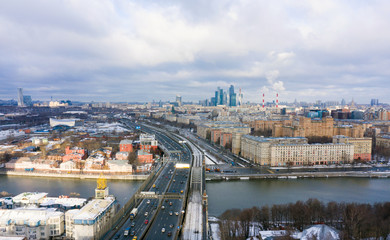 Fototapeta na wymiar panorama of Khamovniki, a district in the central part of Moscow, a multi-lane highway and a view of the city from a height, Frunzenskaya Embankment and the Third Transport Ring